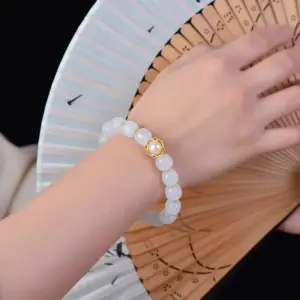 treasure golden silk jade bracelet – gather wealth attract fortune boost luck with pearl accent and gold trim